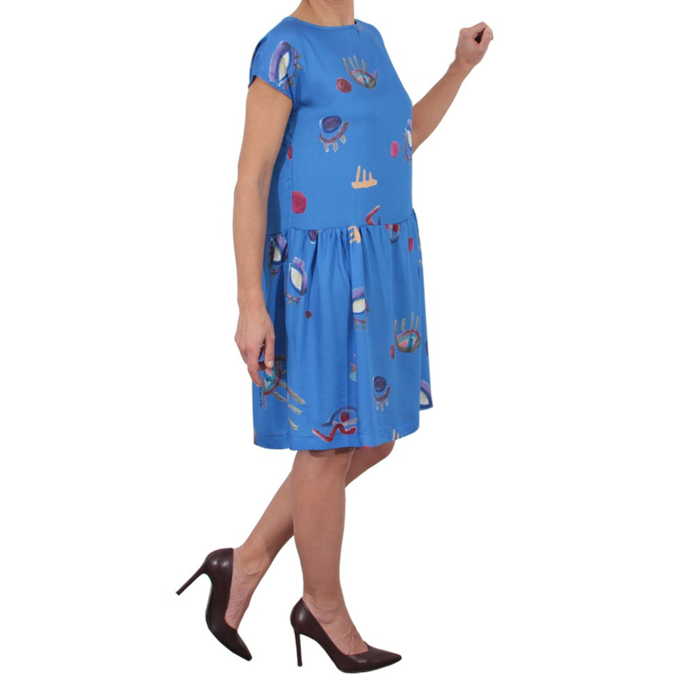 Vestito grembiule bluette con stampe artistiche