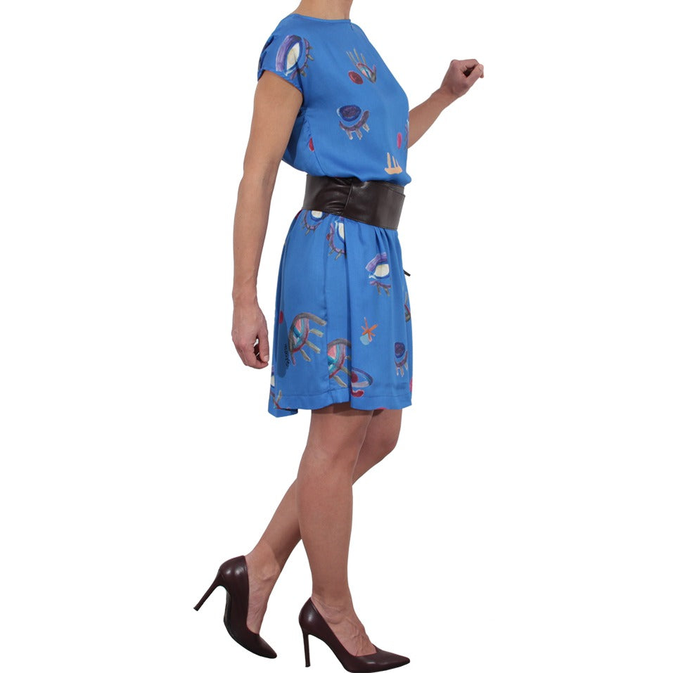 Vestito grembiule bluette con stampe artistiche